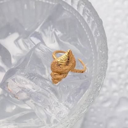 Anillo ajustable con adorno de concha