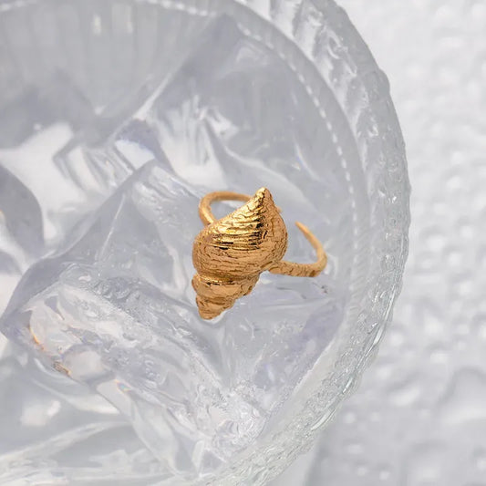 Anillo ajustable con adorno de concha