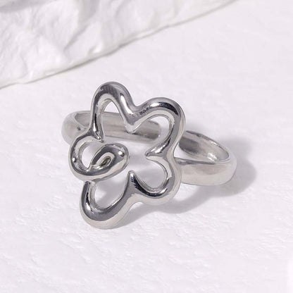 Anillo ajustable con flor plateado. Anillo ajustable para todos los dedos